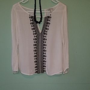 Forever 21 boho shirt with black vintage necklace.